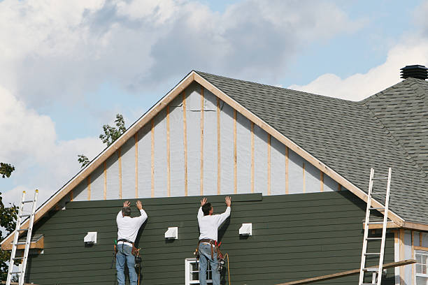 Professional Siding Replacement technician working in Wingate, NC